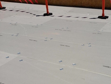 white membrane applied to roof