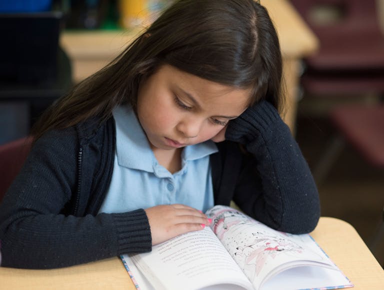 student reading a book