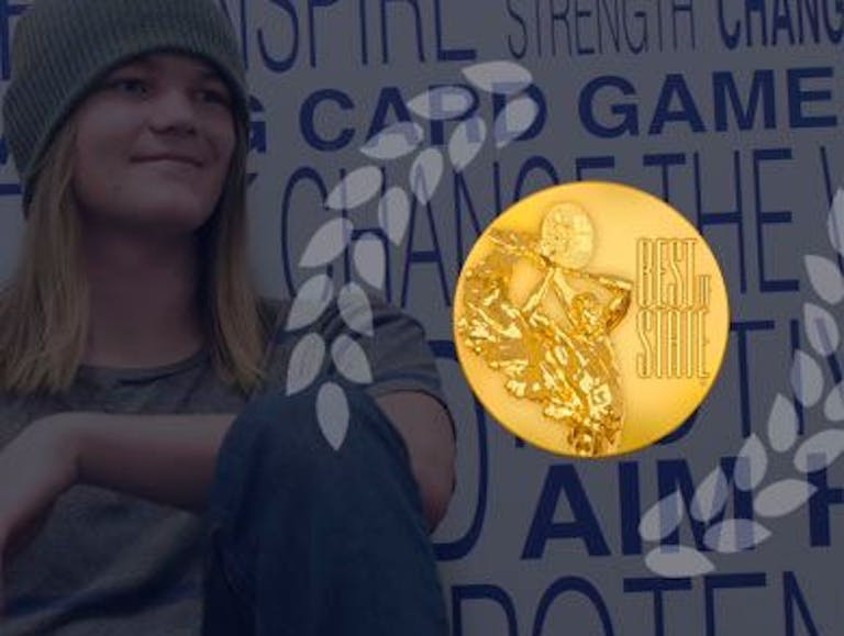 NUAMES student next to Best of State logo